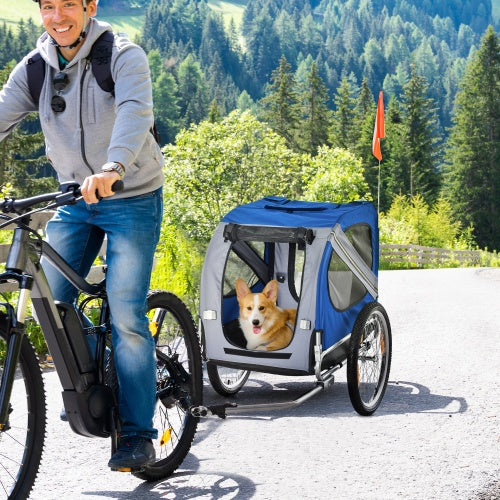 Customer carrying dog in Petnomo Dog Bike Trailer with Mesh & Large Wheels