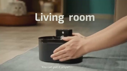 Cat Using Petnomo cordless cat water fountain with motion sensor and quiet operation