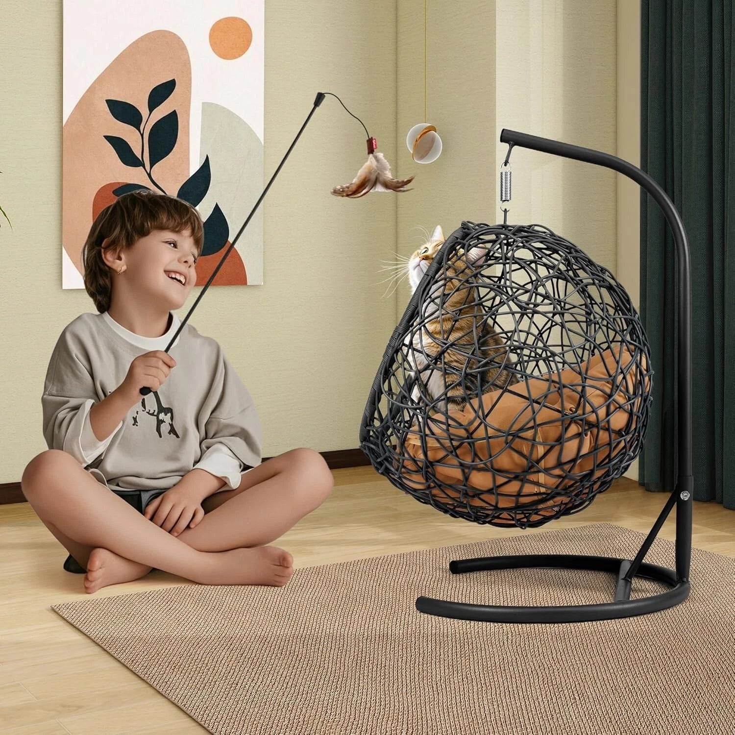 Cat and child playing with Petnomo Modern Pet Hammock Bed with Stand